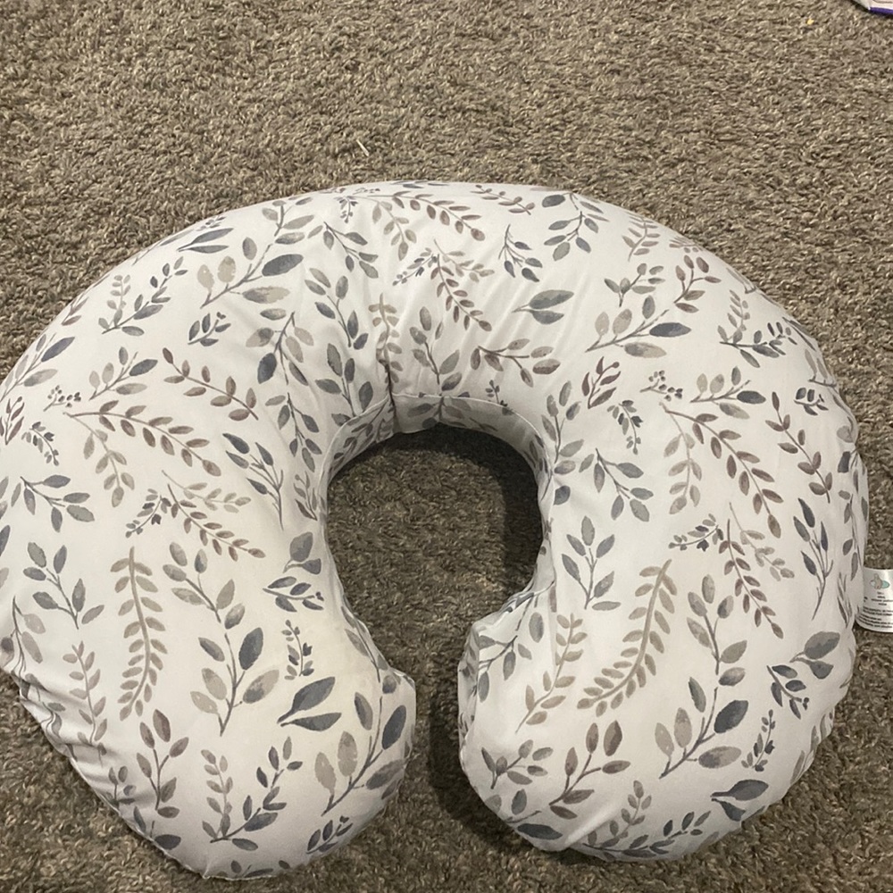 Gray and white boppy pillow